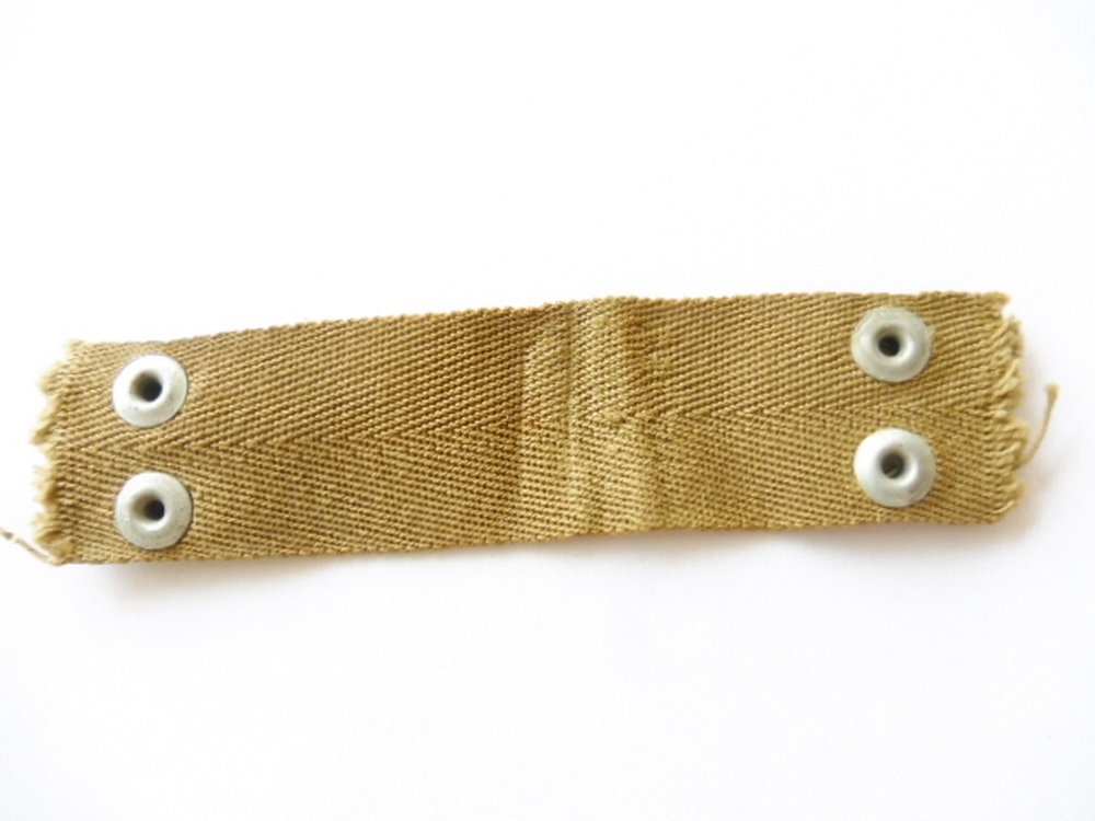 U.S. WWII , Nape strap for helmet liner, size large, khaki, 25,00
