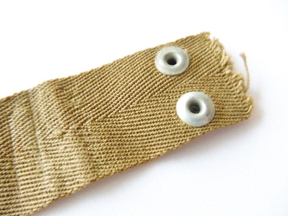 U.S. WWII , Nape strap for helmet liner, size large, khaki, 25,00