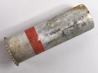 Abgeschossene Aluminiumhülse für die Signalpatrone Einzelstern Rot, datiert 1940, Hersteller Nicolaus