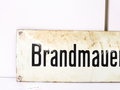 Emailschild " Brandmauerdurchbruch" 10,5 x 42cm, leuchtet im Dunkeln