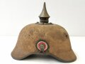 1. Weltkrieg, feldgraue Pickelhaube aus mit Stoff überzogenem Filz. Ungereinigtes Kammerstück des Infanterie Regiment 53