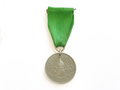 Medaille "Pirmasenser Heimkehr 1940".Zink, gelocht, am konfektionierten Band. Durchmesser 33mm, Rückseitig Sonnenrad