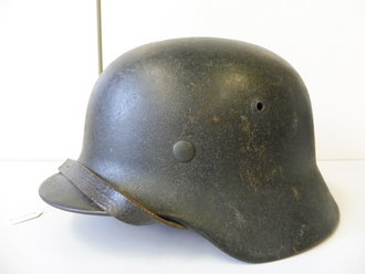 Heer, Stahlhelm M35. Im Krieg wiederaufbereitetes Stück, mit leichtem Rautarn versehen. Leicht getragenes Stück
