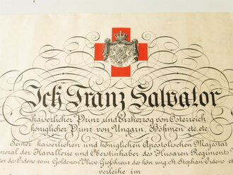 Österreich , Verleihungsurkunde für die bronzene Ehrenmedaille vom Roten Kreuz mit der Kriegsdekoration datiert 1918. Grossformatig