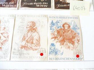 Sammlung Türplaketten des Winterhilfswerk , alle mit Fotoecken fixiert und leicht zu entfernen