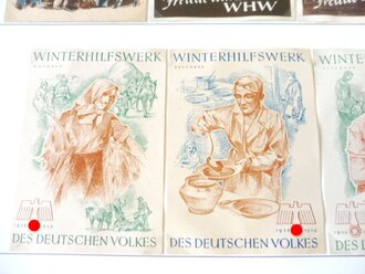 Sammlung Türplaketten des Winterhilfswerk , alle mit Fotoecken fixiert und leicht zu entfernen