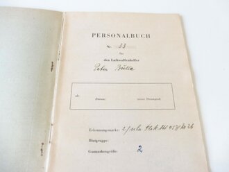 Personalbuch und Personalausweis eines Luftwaffen Helfer bei der schweren Flakabteilung 457 München. Dazu eine Beurteilung sowie das Gesundheitsheft