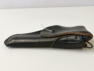 U.S.  Colt holster. Blackened leather, used, good condition