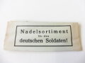 Nadelsortiment für den deutschen Soldaten, grünliches Papier, sie erhalten  ein Stück aus dem originalen Bündel