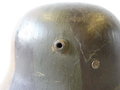 1. Weltkrieg, Stahlhelm M16 in originaler Tarnbemalung, in allen Teilen originaler Helm