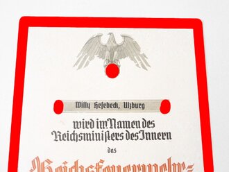 Verleihungsurkunde zum "Reichsfeuerwehr Ehrenzeichen...