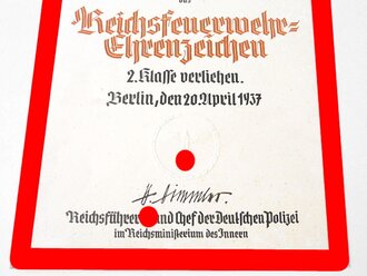 Verleihungsurkunde zum "Reichsfeuerwehr Ehrenzeichen 2.Klasse" Großformatiger Vordruck des Reichsführer SS und Chef der Deutschen Polizei Heinrich Himmler ( Gedruckte Unterschrift ) Relativ dickes Papier mit oberflächlichen Fraßspuren