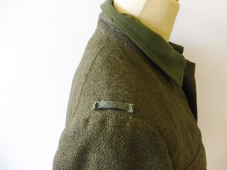 Reichswehr, feldgraue Feldbluse Modell 1919. Kammerstück, stark getragen, ohne Knöpfe und Schoß/Seitenhaken.  Selten