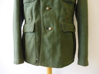 Feldbluse M36 für einen Unteroffizier der Infanterie. Getragenes Kammerstück in gutem Zustand.