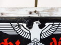 Emailleschild "Hier spricht die NSDAP" 64 x 78cm, auf Holzrahmen aufgeschraubt. Diverse kleinere Reparaturstellen