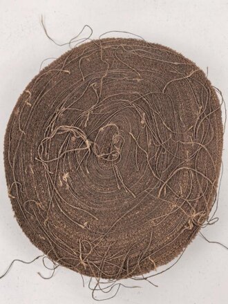 U.S. Tarnmaterial für Stahlhelmnetz. Braun, Durchmesser der Rolle etwa 35cm. Alter und Herkunft unbekann