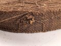 U.S. Tarnmaterial für Stahlhelmnetz. Braun, Durchmesser der Rolle etwa 35cm. Alter und Herkunft unbekann