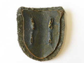 Krimschild, Eisen bronziert, deutlich getragenes Stück