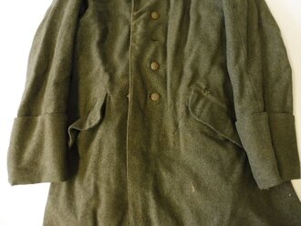 1. Weltkrieg, feldgrauer Mantel für Mannschaften. Kammerstück von 1918, ungereinigter Speicherfund