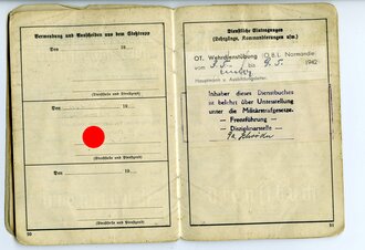 Organisation Todt Dienstbuch eines 1943 in der Normandie eingesetzten Tiefbauarbeiters. Seiten 19-22 fehlen und der Rest löst sich vom Einband