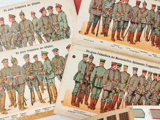 Die graue Felduniform der deutschen Armee, diverse Bildtafeln, gelocht und in einen alten Schnellhefter eingeklebt..