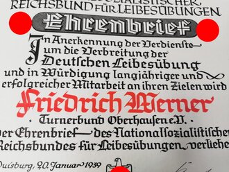 NSRL Ehrenbrief datiert 1939. Grossformatige Urkunde in Mappe, sehr guter Zustand