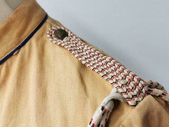 Reichskolonialbund, Uniformjacke aus glattem Stoff mit blauen Vorstößen, die Effekten original vernäht, mit der passenden Fangschnur. Guter Zustand