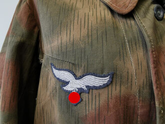 Luftwaffe Feldbluse für Angehörige der Felddivisionen. Sumpftarn, getragenes Stück in gutem Zustand, der Adler höchstwahrscheinlich neuzeitlich ergänzt