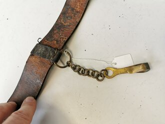 Württemberg, Koppel zu Waffenrock mit eingenähtem Säbelhänger, das Medaillion eingedrückt, ungereinigtes Set