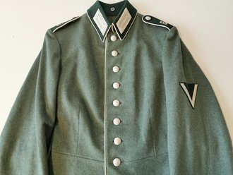 Waffenrock für einen Angehörigen Im Infanterie Regiment 65, Kammerstück in sehr gutem Zustand. Brustadler fehlt, die Effekten sonst original vernäht