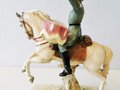 Kesselpauker zu Pferd, Farbige Porzellanfigur der Firma Hertwig & Co., Katzhütte. Ein Bein gebrochen und geklebt, ein Paukenschlägel ergänzt, sonst einwandfrei , Höhe ca. 40cm