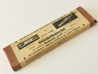"Stiefelknecht" in der originalen Umverpackung, diese als Feldpostpaket verschickbar