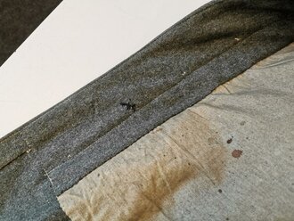 1.Weltkrieg, feldgrauer Mantel für Mannschaften , Kammerstück datiert 1916/1917. Stärker getragen, Schulterbreite 49 cm, Armlänge 67 cm