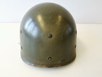 U.S. WWII steel helmet liner made by Westinghouse. Later war OD interieur, original paint