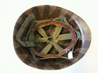 U.S. WWII steel helmet liner made by Westinghouse. Later war OD interieur, original paint
