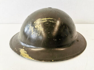 British 1942 dated steel helmet , due to service after the war repainted and new model chin strap atttached, liner is 1943 dated, uncleaned