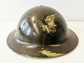 British 1942 dated steel helmet , due to service after...