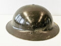 British 1942 dated steel helmet , due to service after the war repainted and new model chin strap atttached, liner is 1943 dated, uncleaned