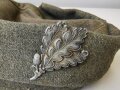 Heer, Feldmütze M43 für einen Jäger. Getragenes Stück mit alter Reparaturstelle, die Effekten original vernäht