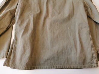 USMC Pattern 41 HBT field jacket. Used, larger damage on shoulder