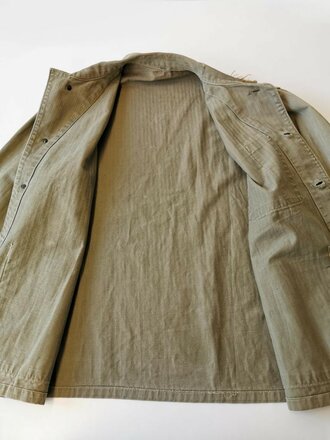 USMC Pattern 41 HBT field jacket. Used, larger damage on shoulder
