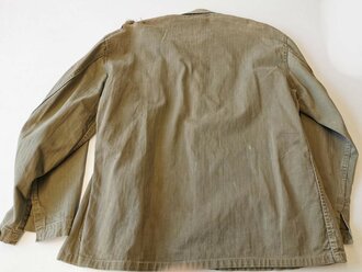 USMC Pattern 41 HBT field jacket. Used, larger damage on shoulder