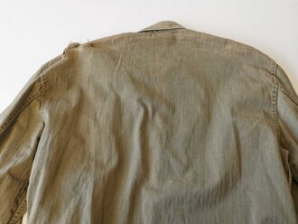 USMC Pattern 41 HBT field jacket. Used, larger damage on shoulder