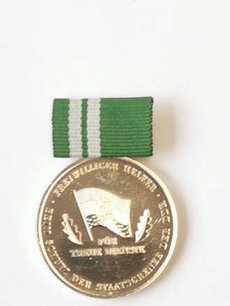 DDR Medaille für treue Dienste freiwilliger Helfer...