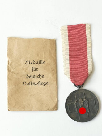 Medaille Deutsche Volkspflege, am Band, mit defekter...