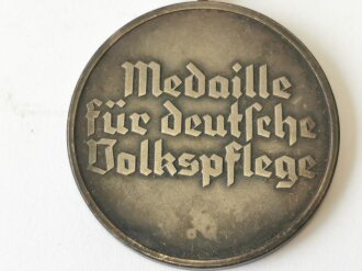 Medaille Deutsche Volkspflege, am Band, mit defekter Tüte des Hauptmünzamt Wien