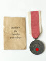 Medaille Deutsche Volkspflege, am Band, mit defekter Tüte des Hauptmünzamt Wien