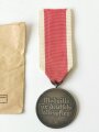 Medaille Deutsche Volkspflege, am Band, mit defekter Tüte des Hauptmünzamt Wien