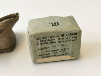 Kombiniertes Preßstück datiert 1941 in Tasche, gehört so in den Verbandkasten