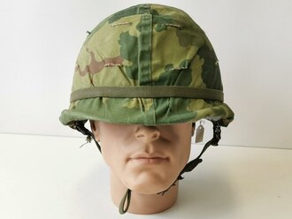 U.S. Vietnam war steel helmet. Mitchell cover dated 68